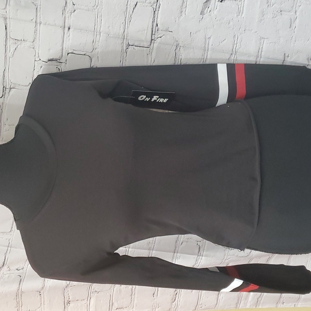 Brand New!  Black long sleeved- crop top, red and white stripes on sleeves